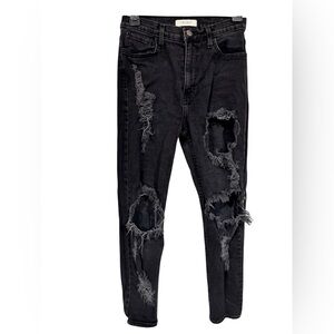 Vibrant Black Distressed Skinny Jeans